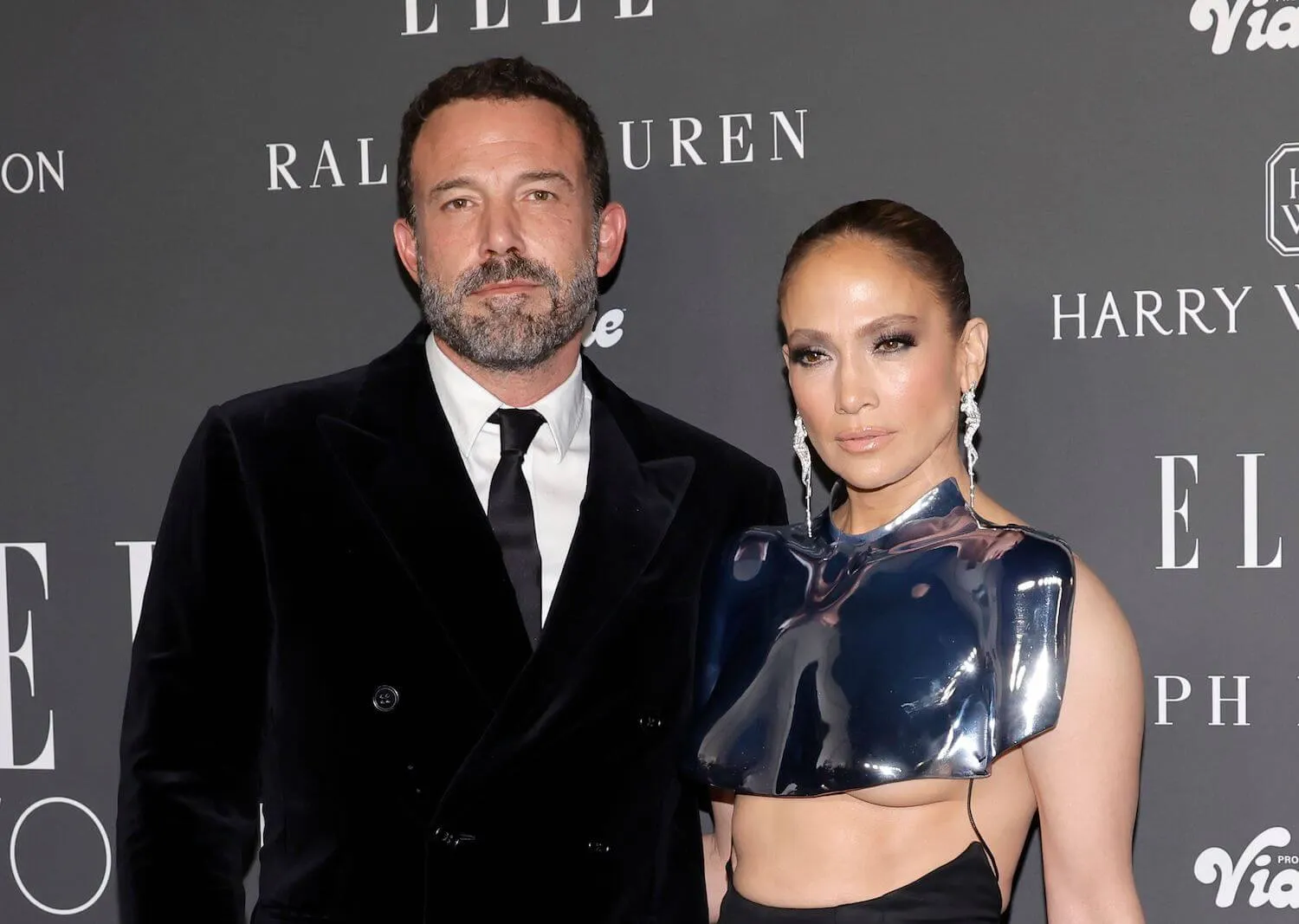 Ben Affleck and Jennifer Lopez posing together at Elle's Women in Hollywood Celebration in 2023