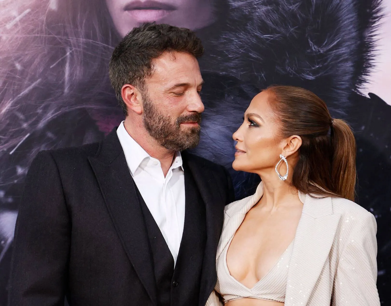 Ben Affleck and Jennifer Lopez looking at each other at a movie premiere in May 2023