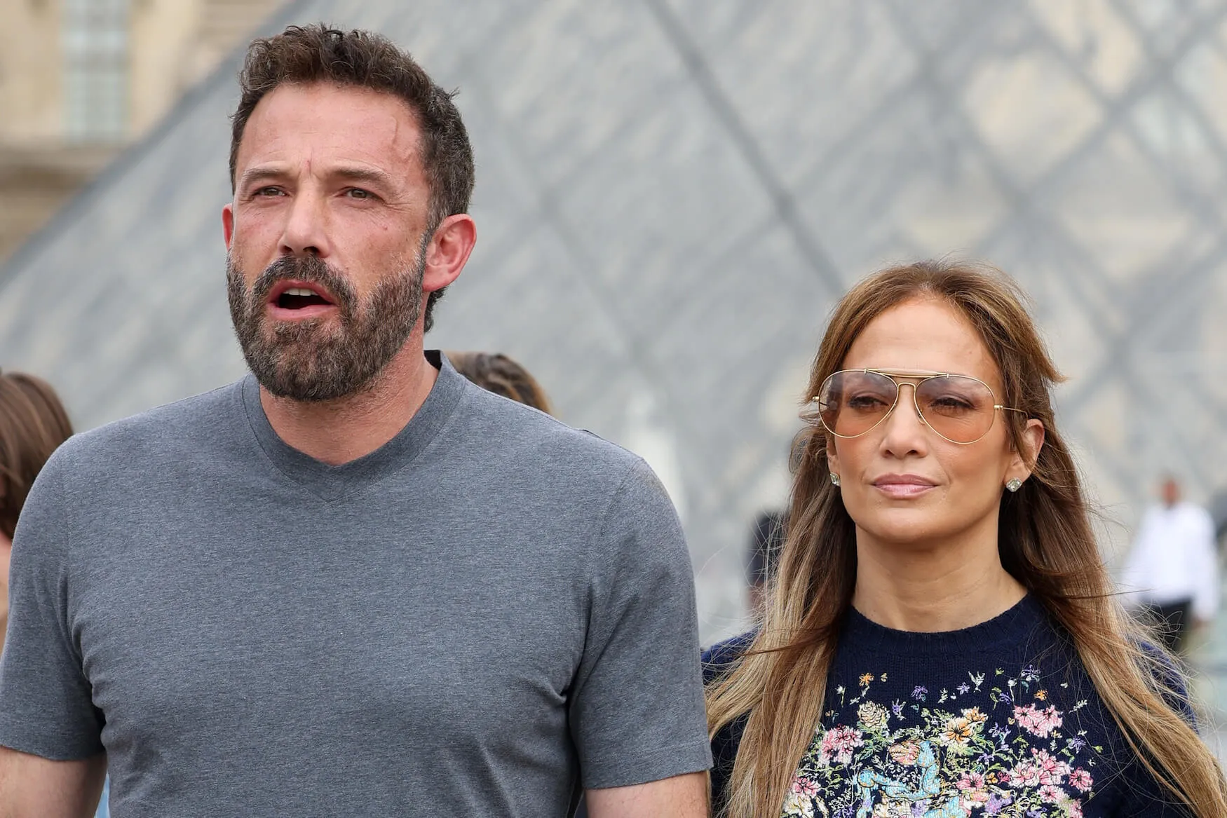Ben Affleck and Jennifer Lopez walking next to each other in casual clothes in Paris in 2022