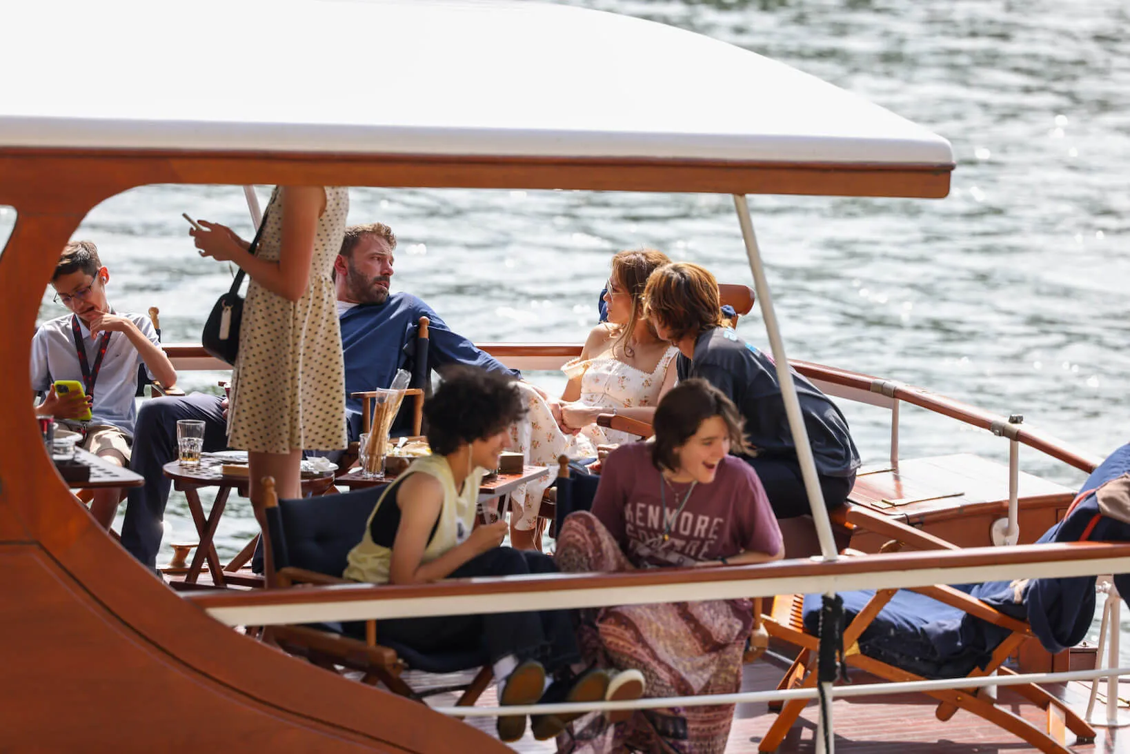 Ben Affleck and Jennifer Lopez on a river cruise in Paris with Emme Muniz and Fin Affleck in 2022