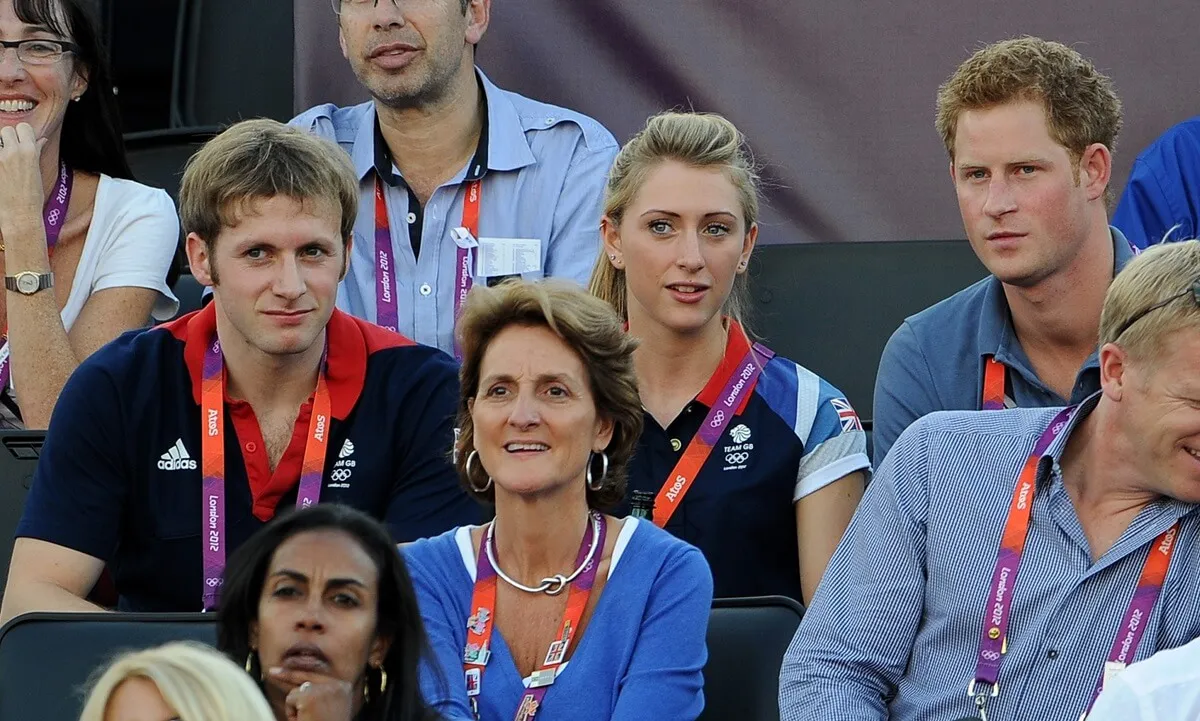 British cyclists Jason Kenny and Laura Trott watch Beach Volleyball with Prince Harry on Day 12 of the London 2012 Olympic Games