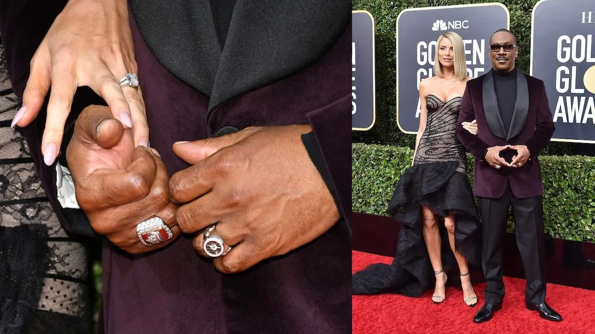 Wearing a velvet suit and black dress, Eddie Murphy and Paige Butcher smile at each other on the red carpet at the 77th Annual Golden Globe Awards