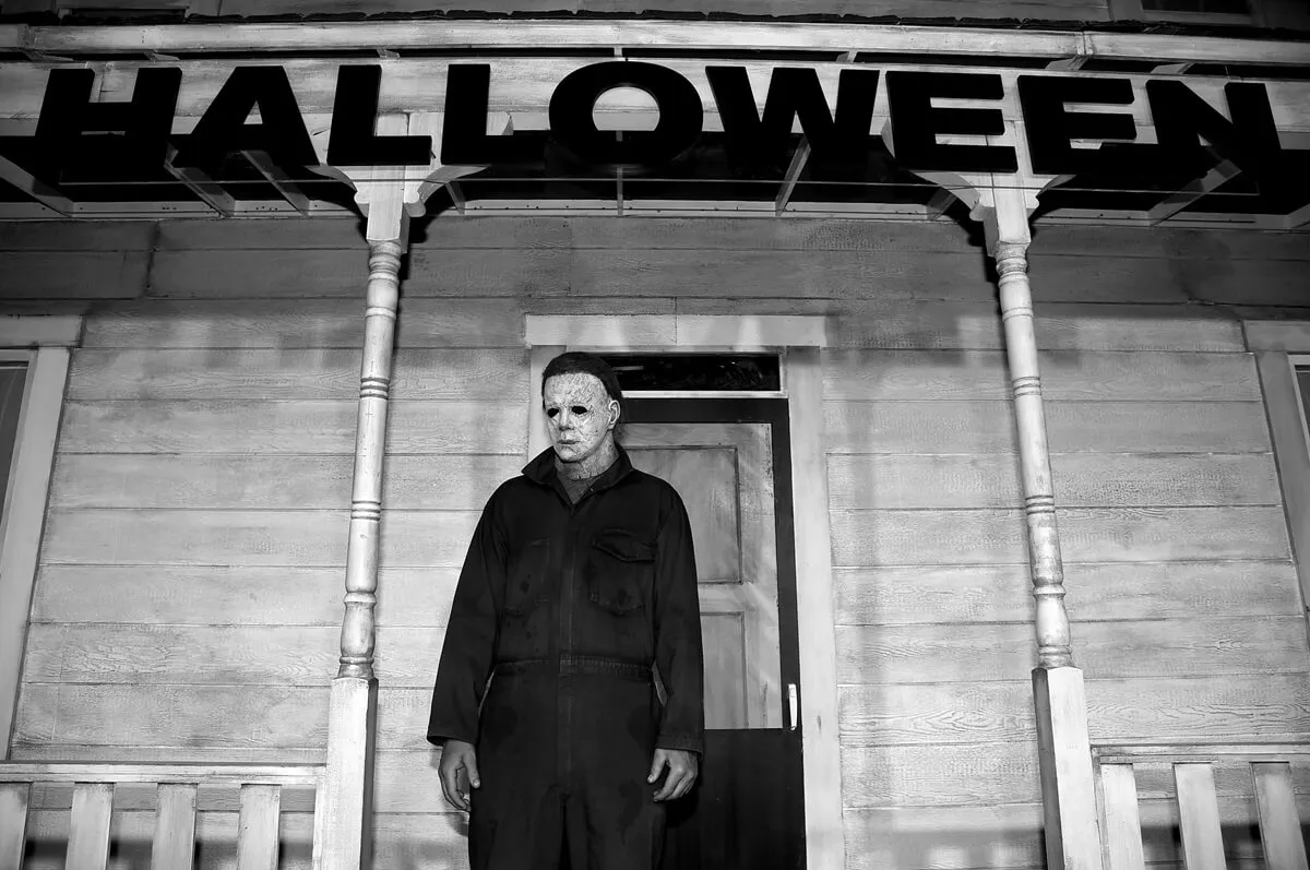 An actor posing as Michael Myers from the Halloween films the premiere of Universal Pictures' "Halloween".