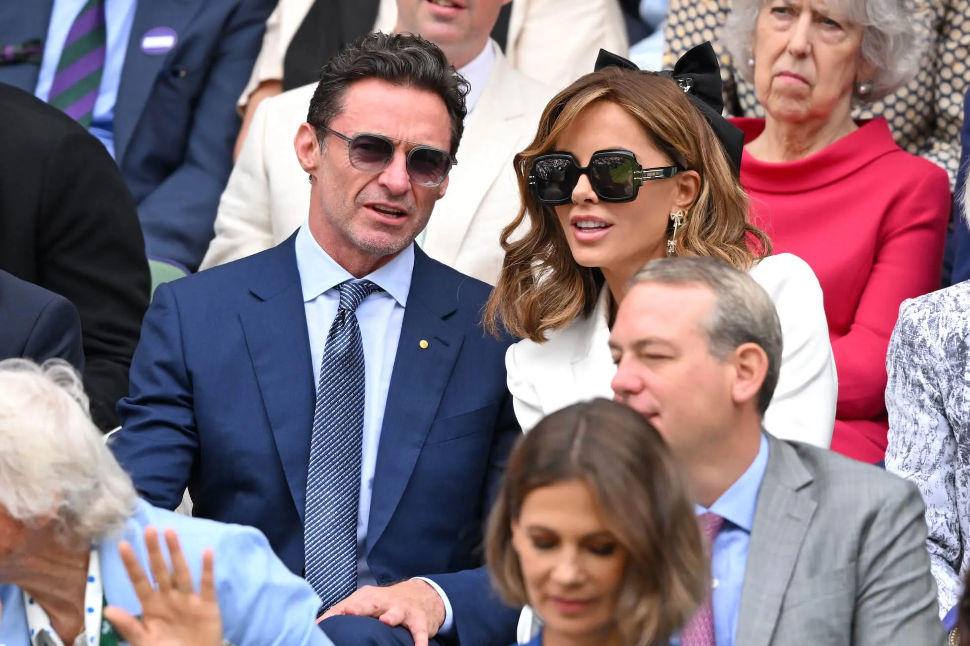 Hugh Jackman and Kate Beckinsale sitting next to each other at Wimbledon in 2024