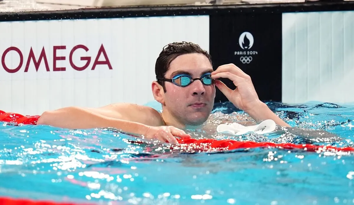 Jack Alexy in the pool after the Men's 100m Freestyle heats at the 2024 Paris Olympic Games
