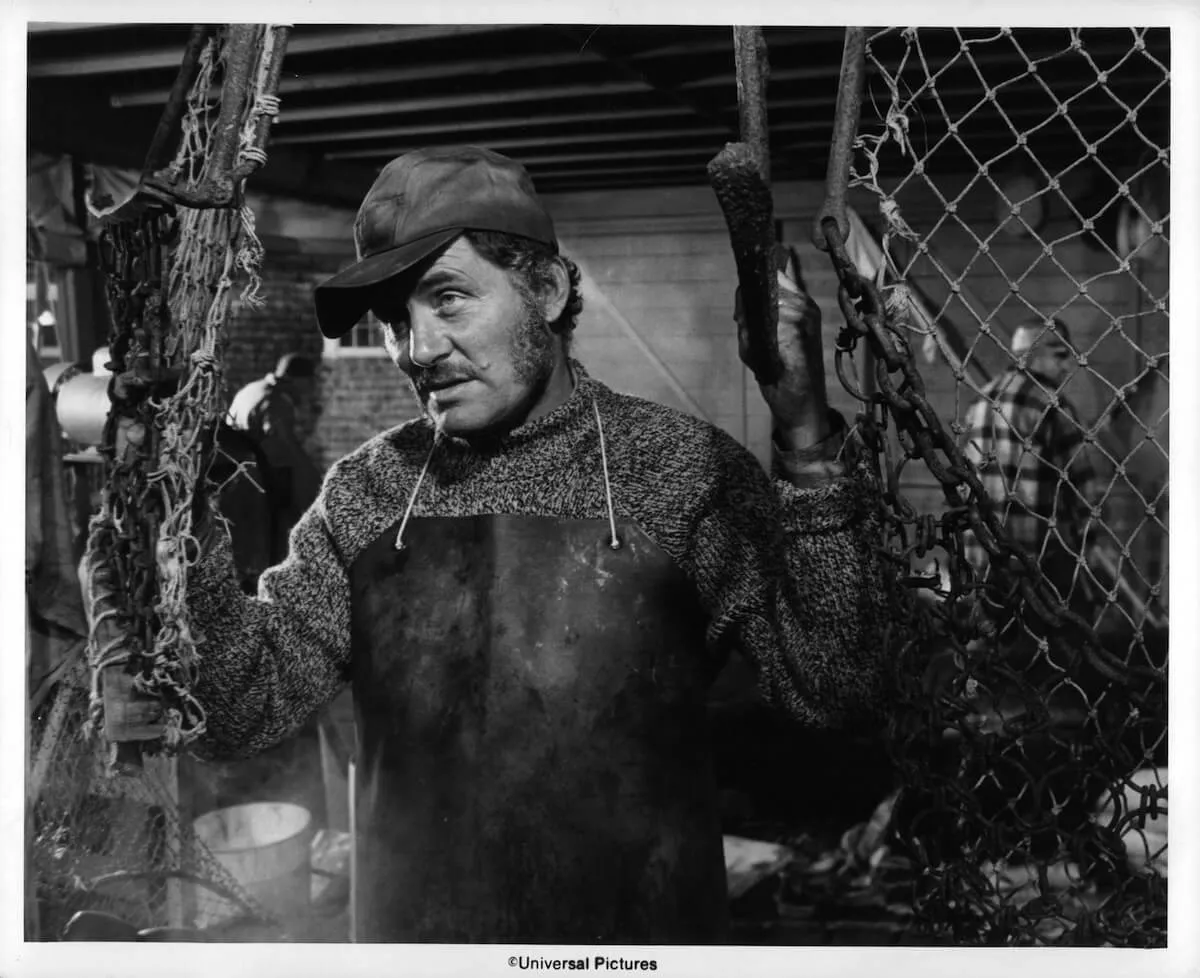 black and white photo of Quint with fishing nets in 'Jaws'