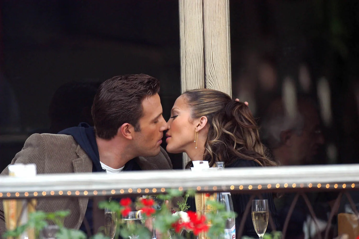 Jennifer Lopez and Ben Affleck kissing on the set of 'Jenny From the Block' in 2002