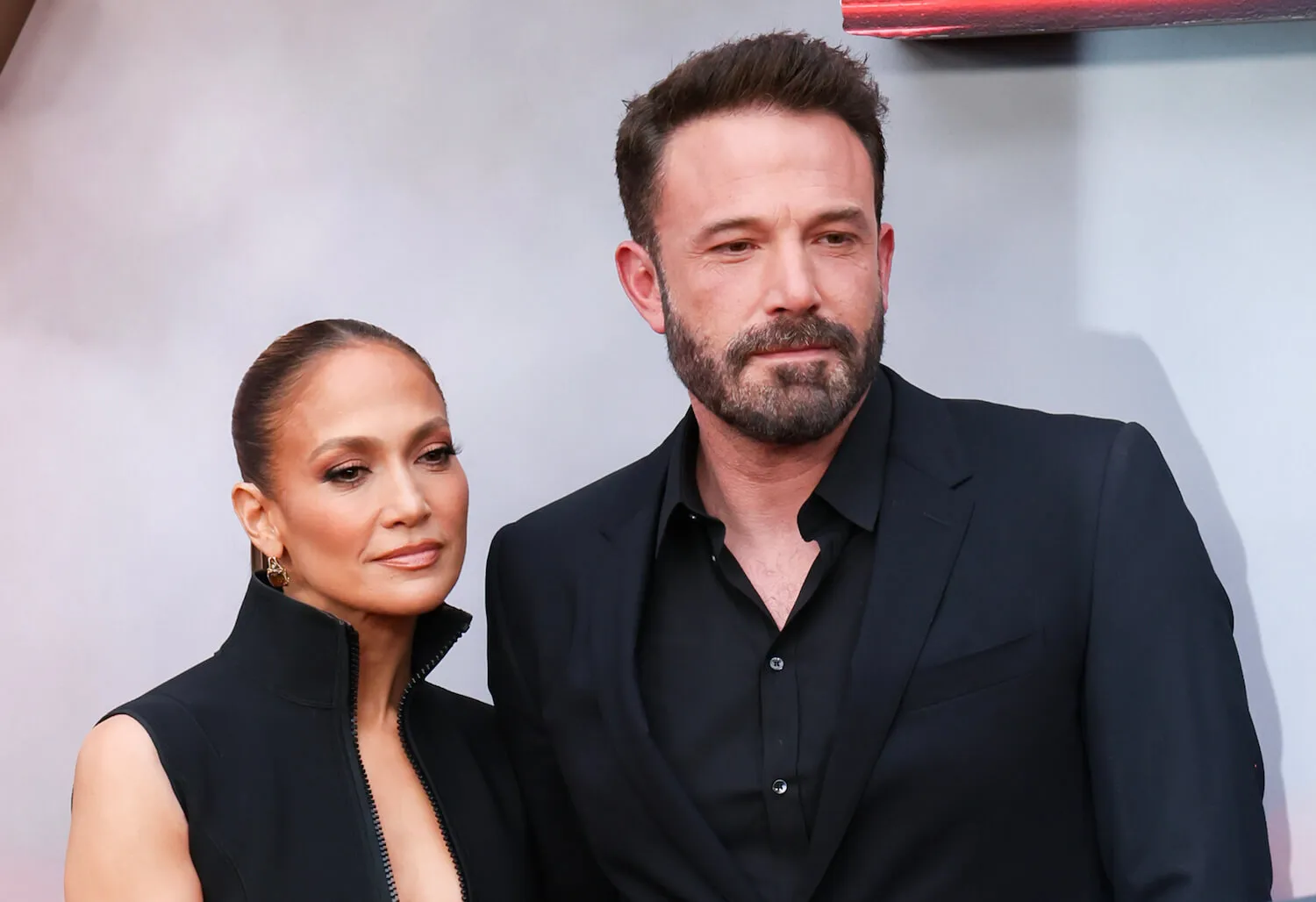Jennifer Lopez and Ben Affleck standing next to each other at a Los Angeles movie premiere