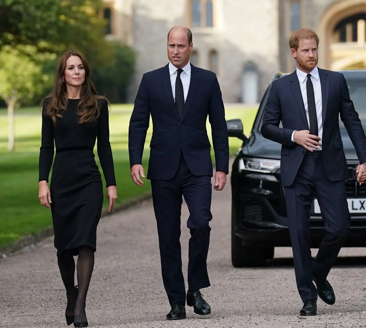 Kate Middleton, Prince William, and Prince Harry on the Long Walk at Windsor Castle to view Queen Elizabeth II tributes