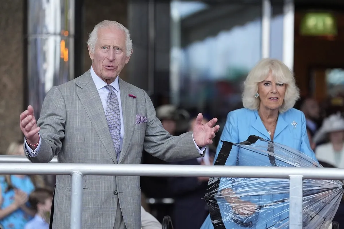 King Charles III and Queen Camilla attend a parade in St. Helier, Jersey