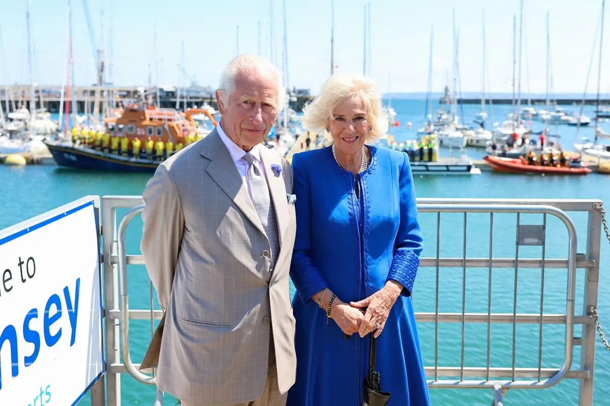 King Charles III and Queen Camilla pose during tour of island in St Peter Port, Guernsey