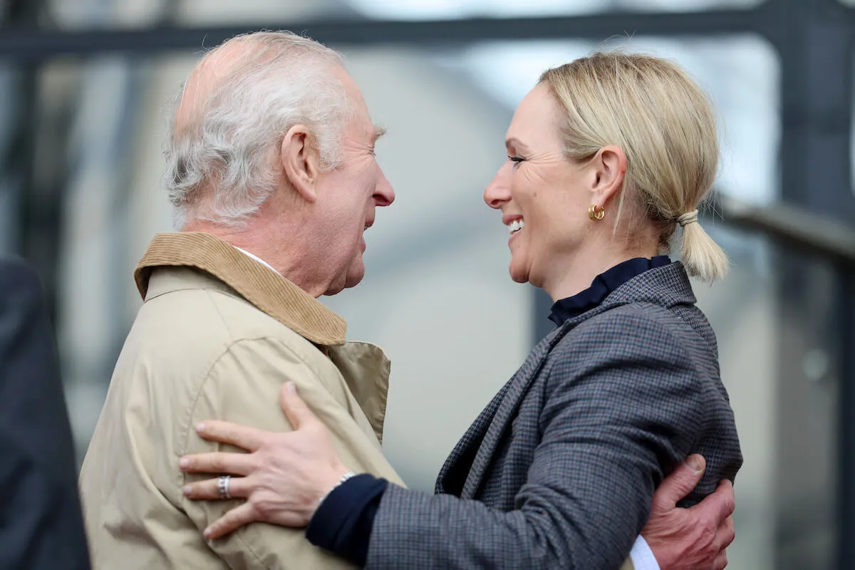 King Charles and Zara Tindall, for whom the king may change the Balmoral schedule for this summer, hug