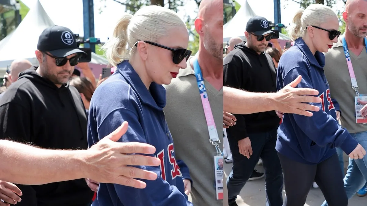 Engaged couple Lady Gaga and Michael Polansky walk through a crowd at the Paris 2024 Olympic Games