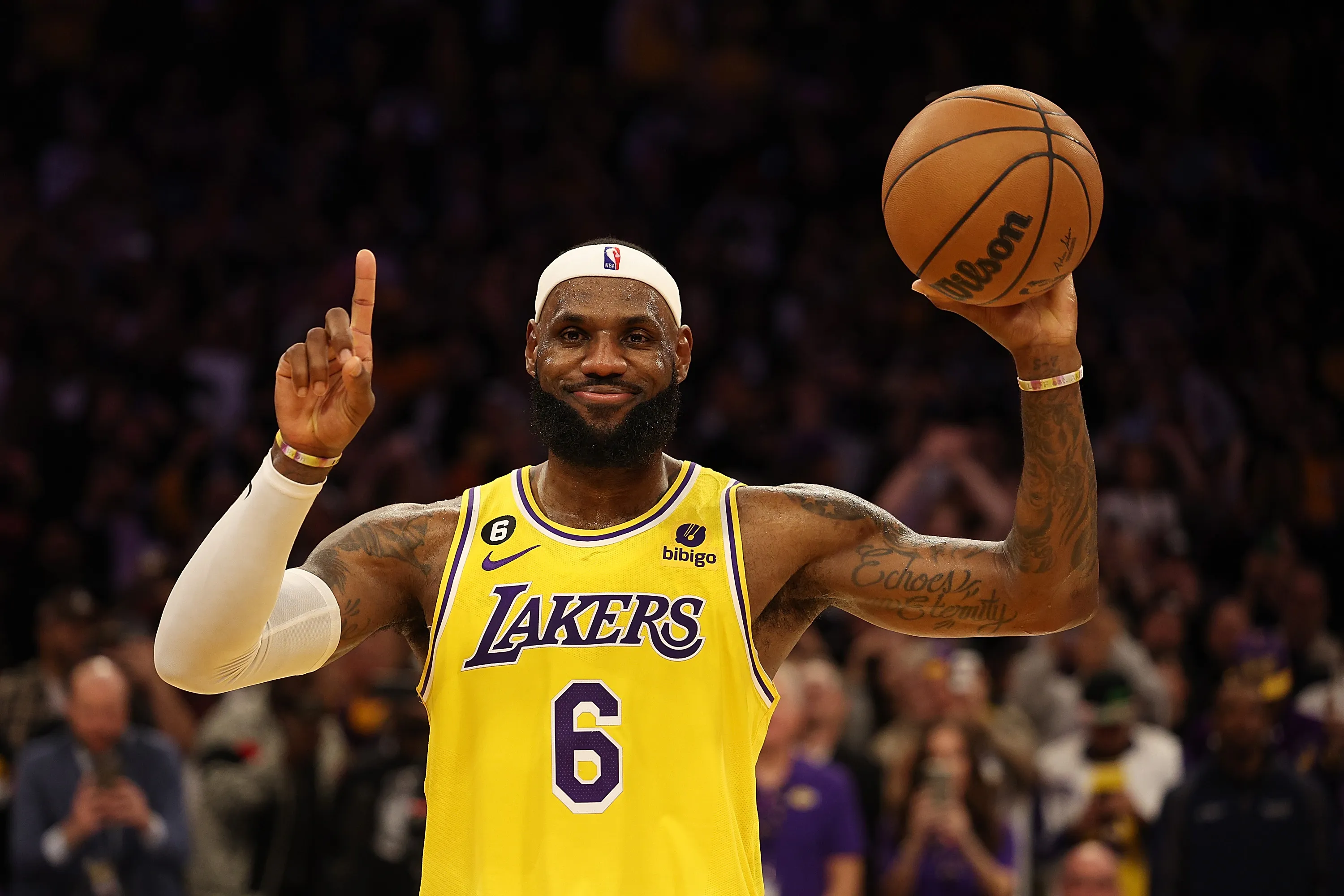 LeBron James reacts after scoring to pass Kareem Abdul-Jabbar to become the NBA's all-time leading scorer