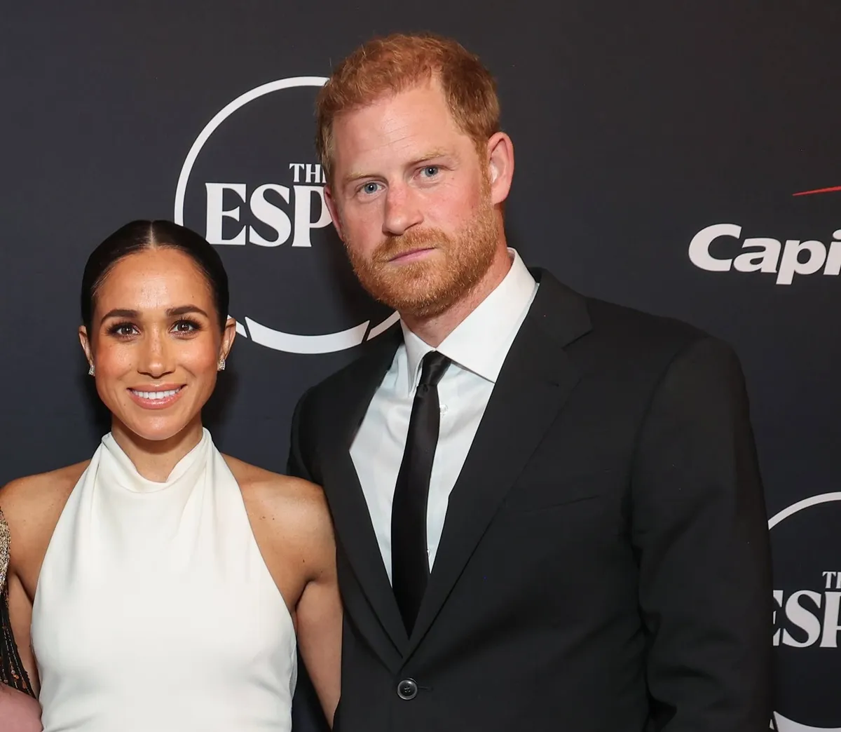 Meghan Markle and Prince Harry pose on the carpet at the ESPY Awards