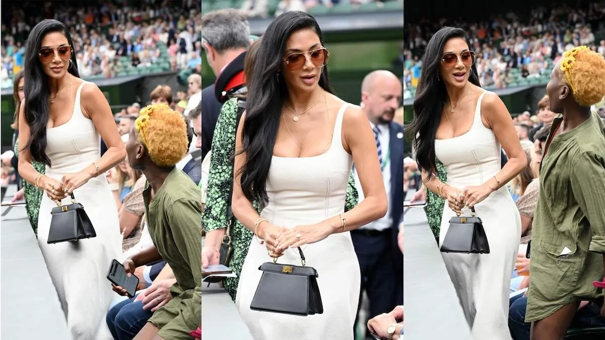 Wearing a cream dress and gold jewelry, Nicole Scherzinger sits front row at Wimbledon 2024