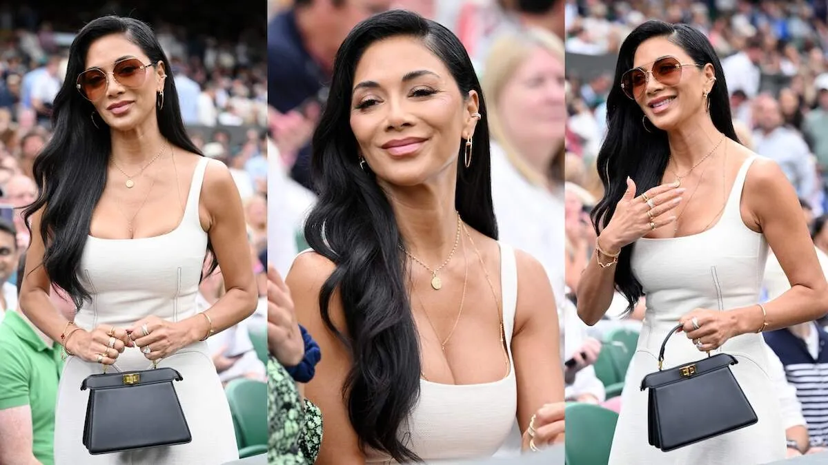 Wearing a cream dress and gold jewelry, Nicole Scherzinger sits front row at Wimbledon 2024