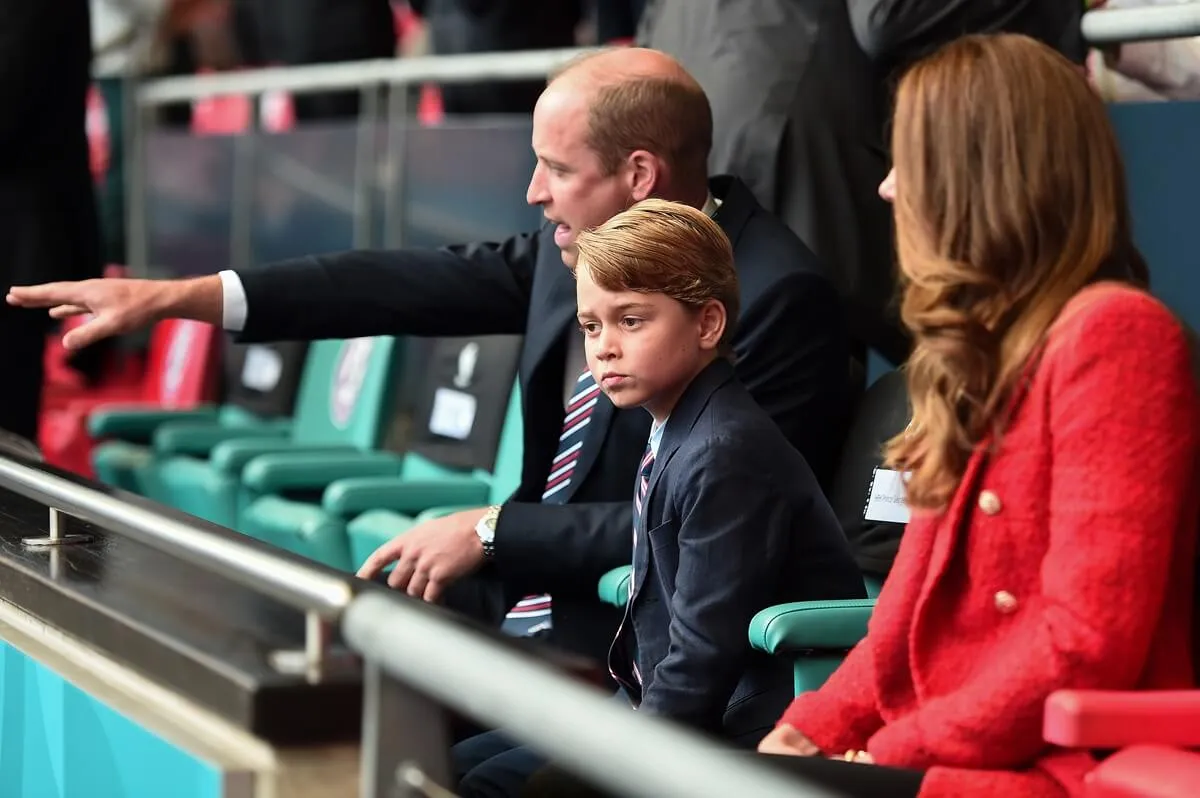 Prince George sitting with his parents during the UEFA Euro Championship Round at Wembley Stadium