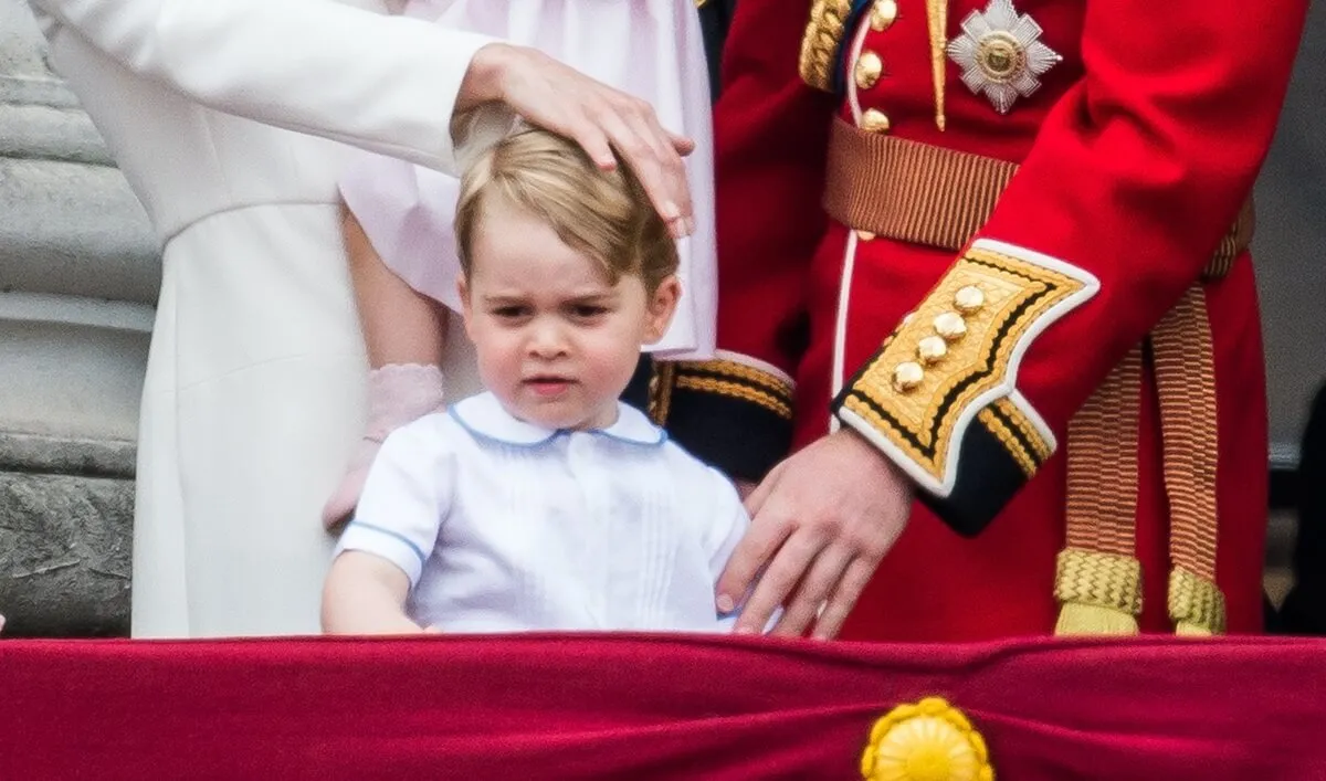 Prince George standing on the balcony with his family during 2016 Trooping the Colour