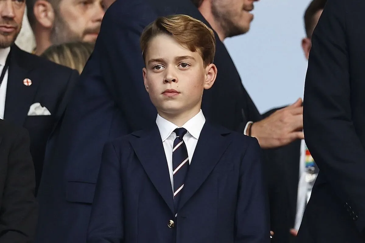 Prince George, who appeared in an 11th birthday portrait, wears a suit.