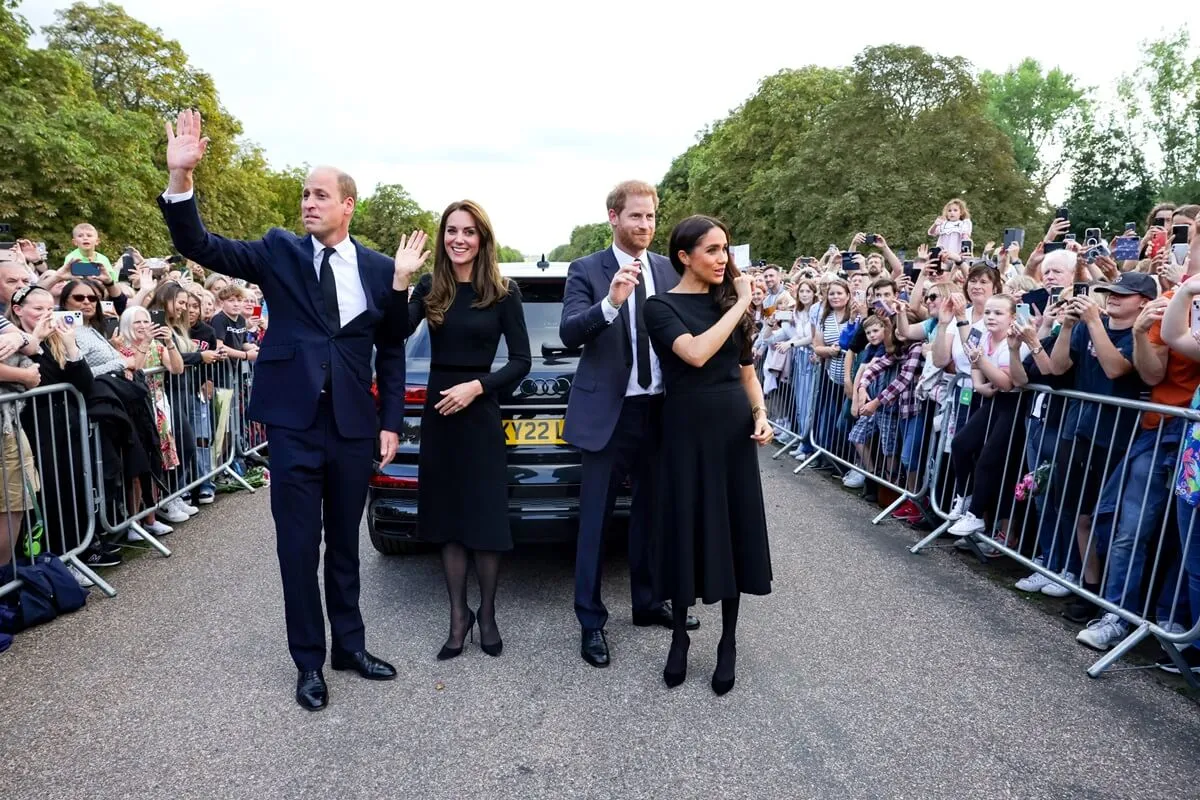 Prince William, Kate Middleton, Meghan Markle, Prince Harry wave to crowd on the Long Walk at Windsor Castle following Queen Elizabeth's death