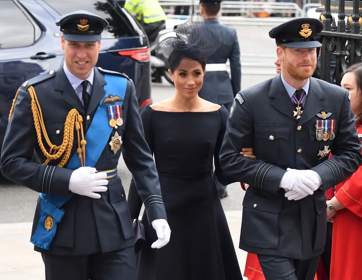 Prince William, Meghan Markle, and Prince Harry arrive for a service to mark the centenary of the Royal Air Force at Westminster Abbey