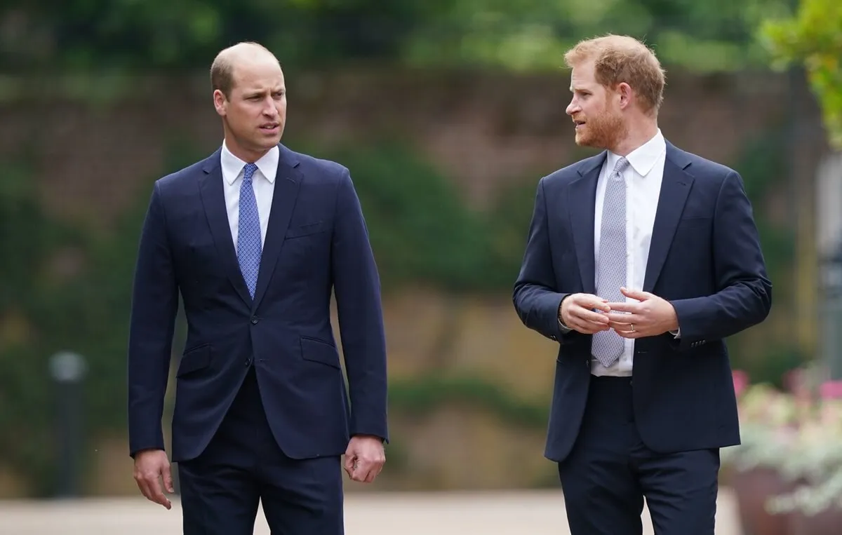 Prince William and Prince Harry arrive for the unveiling of a statue they commissioned of their mother, Princess Diana