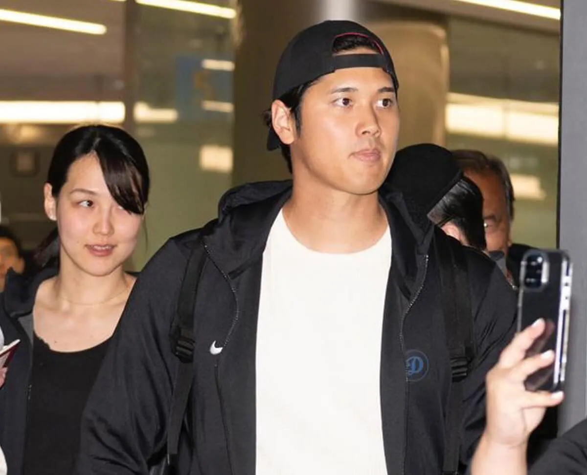 Shohei Ohtani of the Los Angeles Dodgers and his wife, Mamiko Tanaka, are seen on arrival at Incheon International Airport