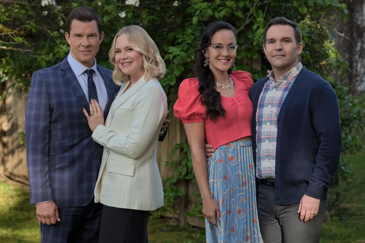 Two couples from Hallmark's 'Signed, Sealed, Delivered' series posing for a photo