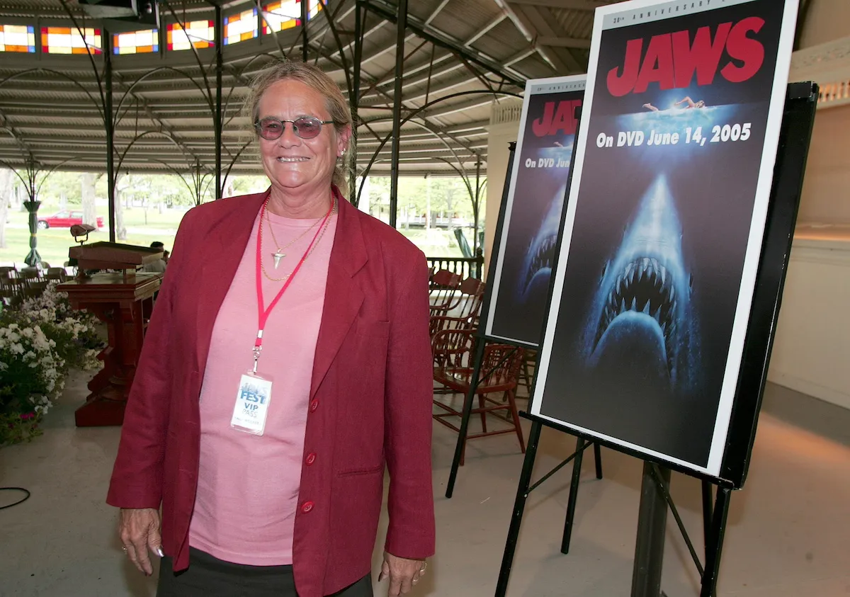 Susan Backlinie in front of a poster advertising 'Jaws'
