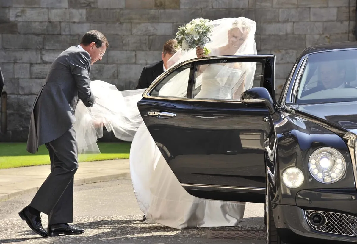 Zara Phillips leaves Holyrood Palace in Edinburgh, Scotland and heads to church for her wedding to Mike Tindall