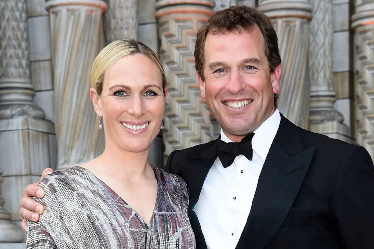 Zara Tindall and Peter Phillips, who didn't together at Wimbledon, in 2022 posing for a photo together.