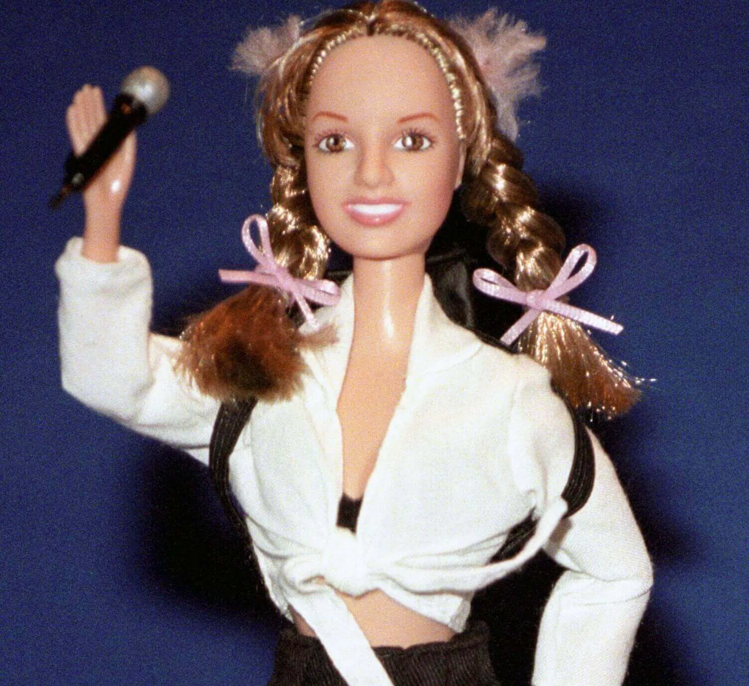A doll dressed like Britney Spears in the "...Baby One More Time" video