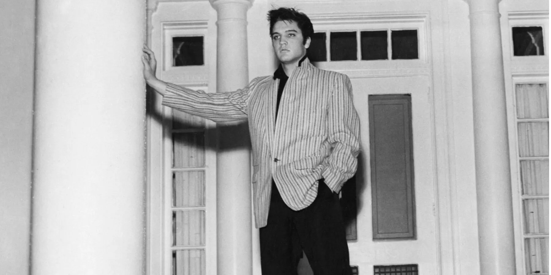 Elvis Presley outside of Graceland in Memphis, Tennessee