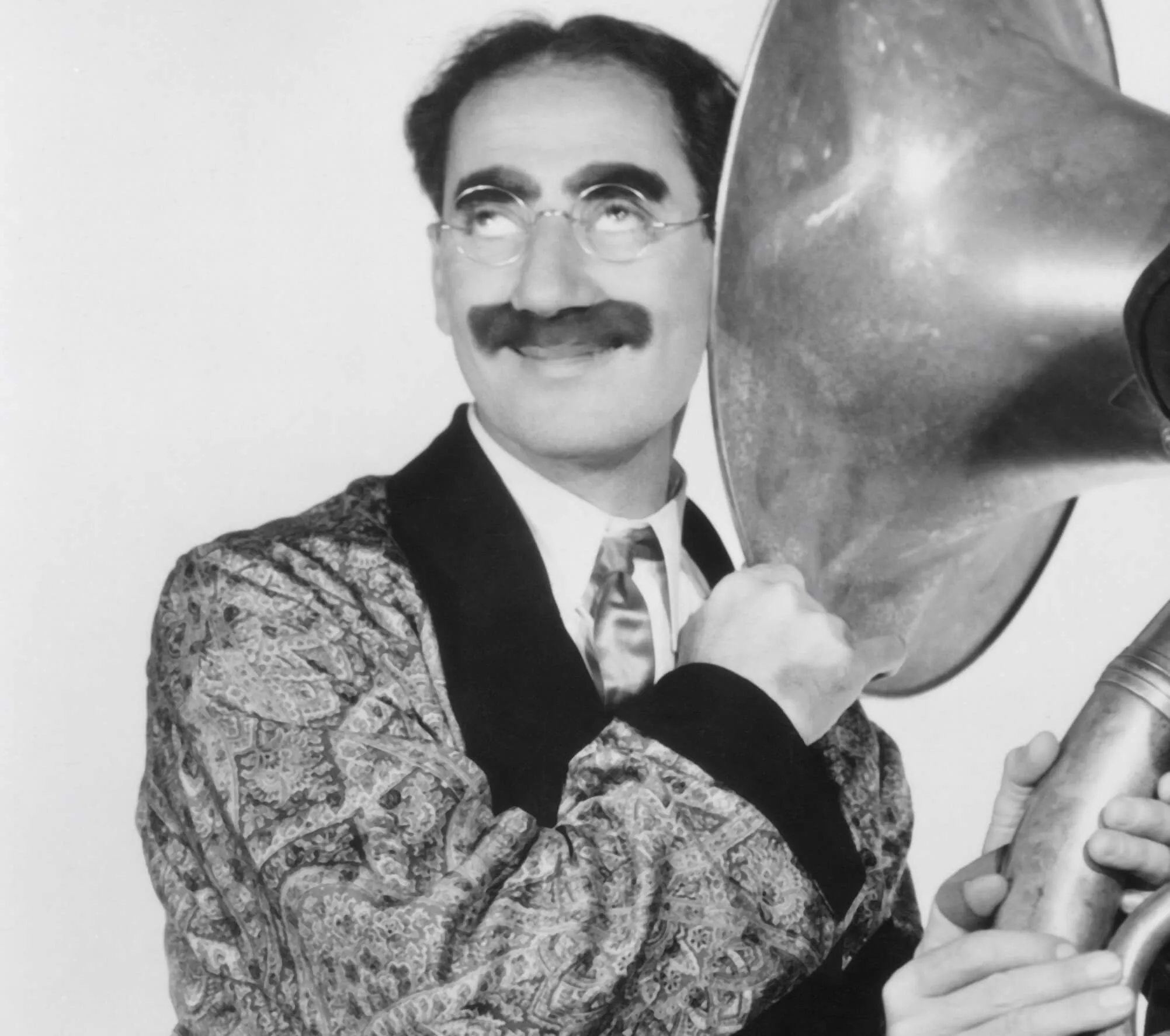 Groucho Marx with a tuba
