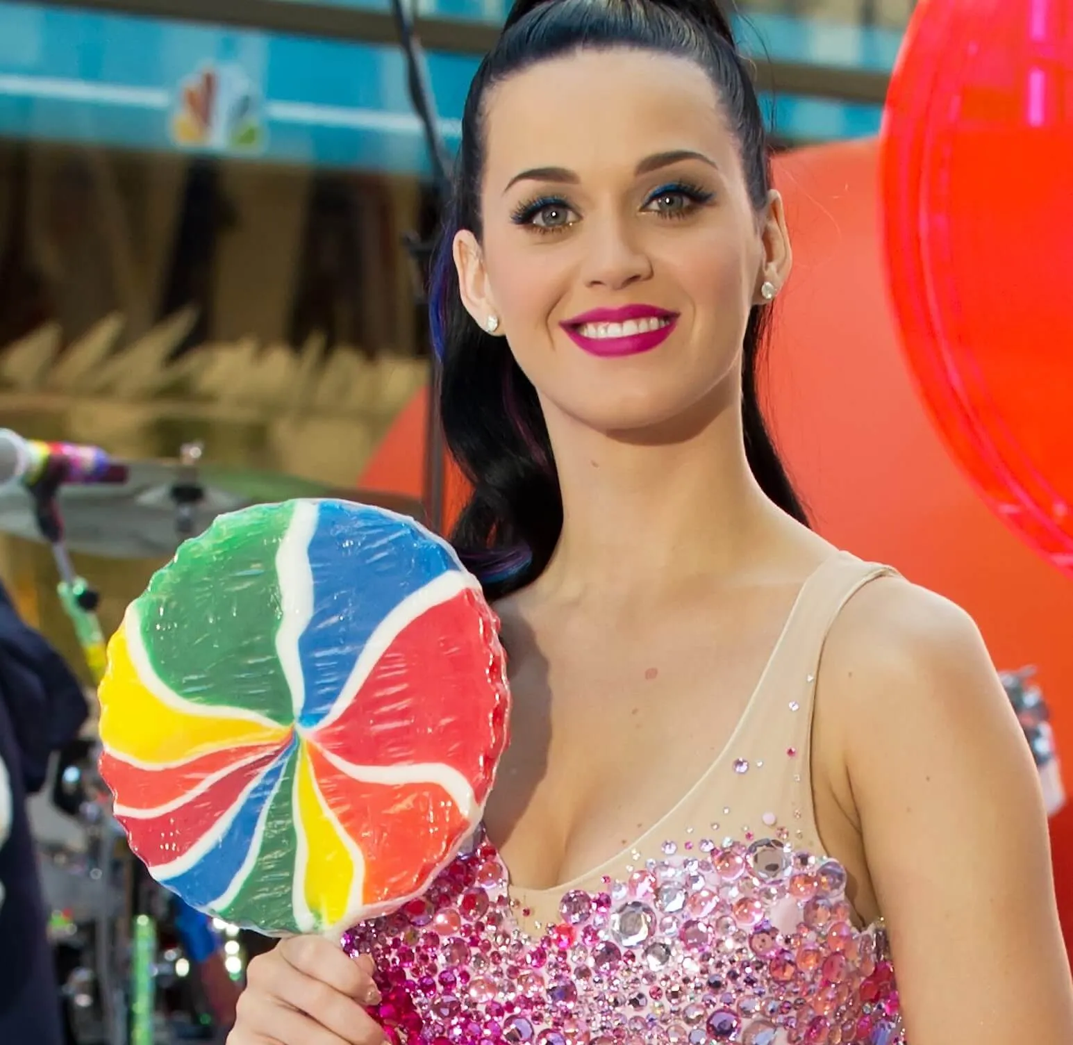 "Teenage Dream" star Katy Perry with a microphone