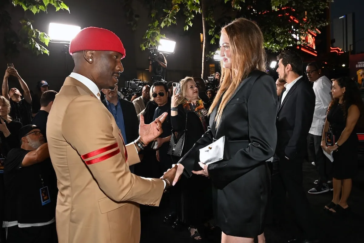 Actor Tyrese Gibson holds Karsen Liotta's hand and greets her at the 1992 premiere