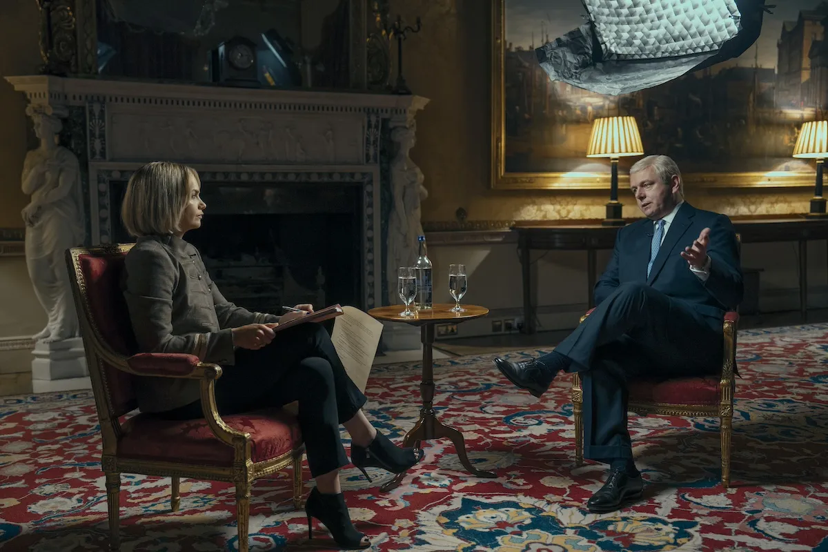 Emily Maitlis (Ruth Wilson) interviews Prince Andrew (Michael Sheen) in 'A Very Royal Scandal'