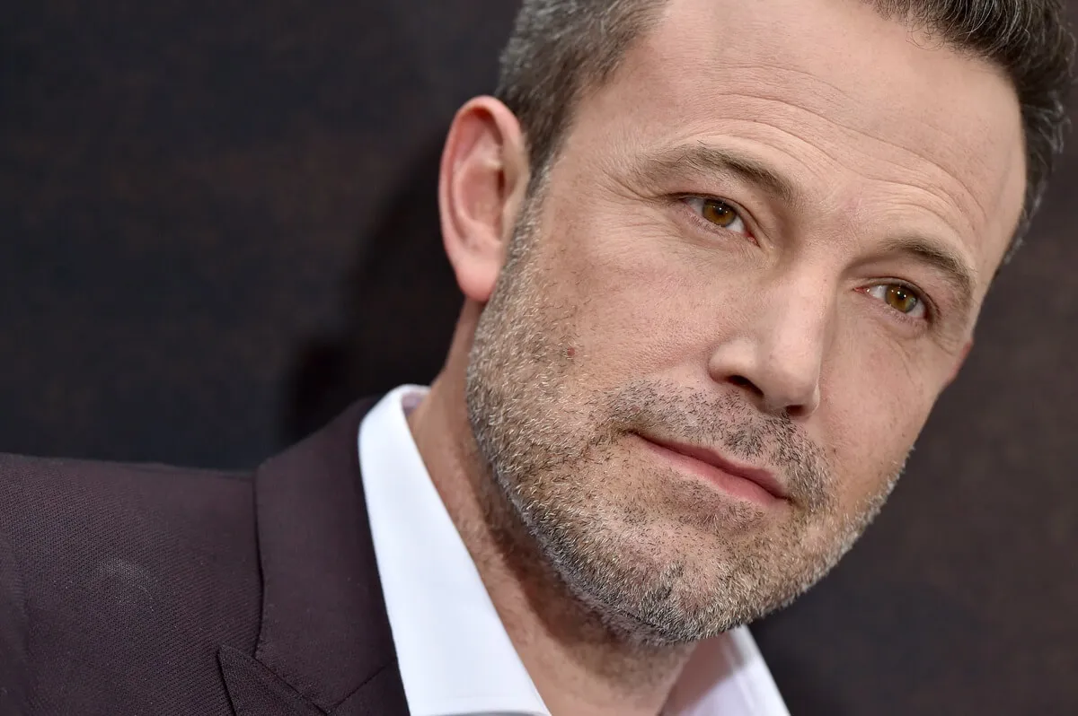 Ben Affleck posing in a suit at the premiere of 'The Way Back'.