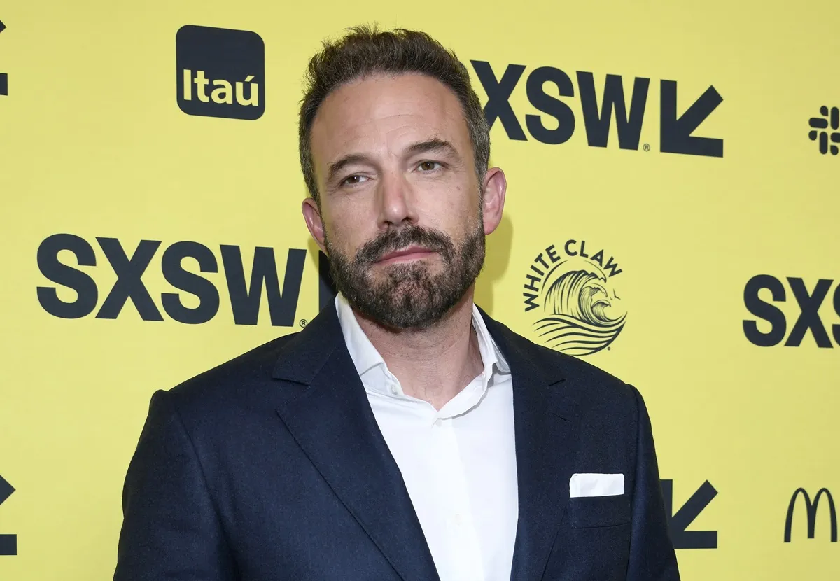 Ben Affleck posing in a suit at SXSW.