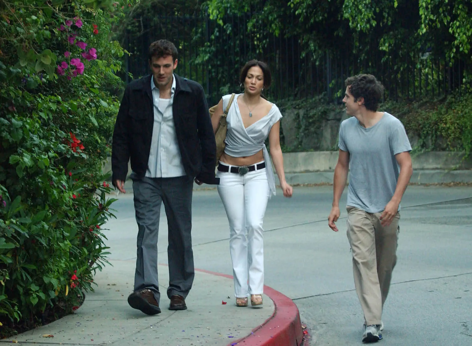 Ben Affleck, Jennifer Lopez, and Casey Affleck walking together in Los Angeles in 2002