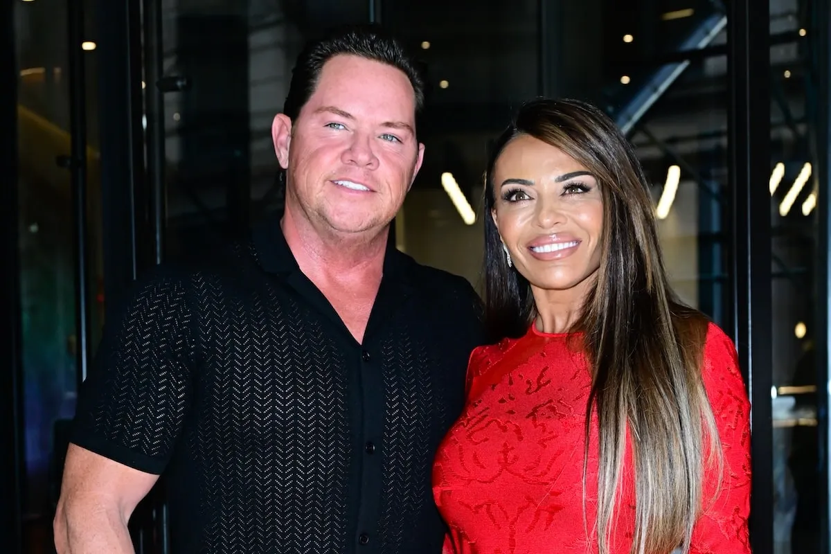 The Real Housewives of New Jersey star Dolores Catania wears a tight red dress alongside her boyfriend Paulie Connell