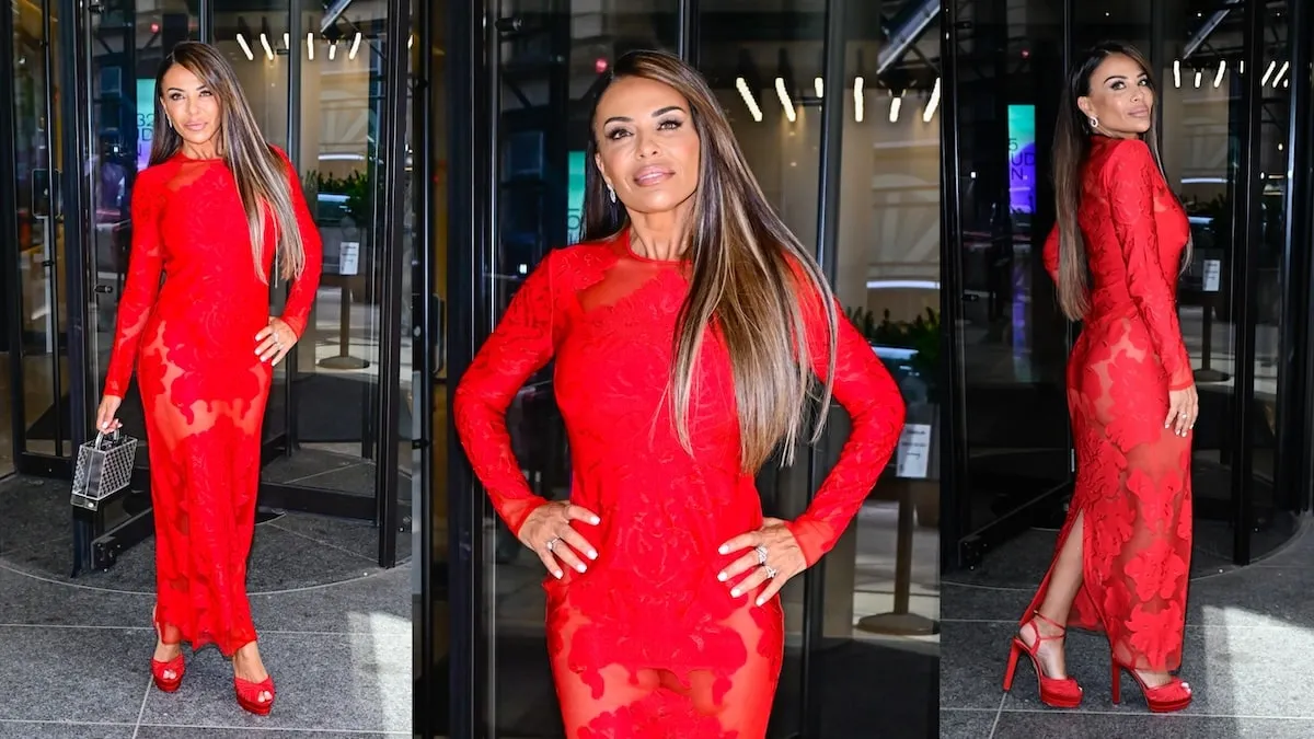 The Real Housewives of New Jersey star Dolores Catania models a tight red dress outside an NYC building