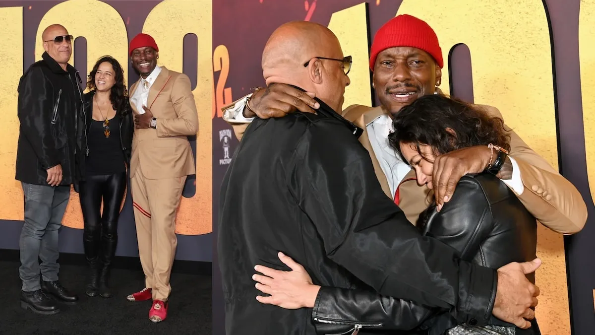 Friends Vin Diesel, Michelle Rodriguez and Tyrese Gibson hug each other on the 1992 red carpet