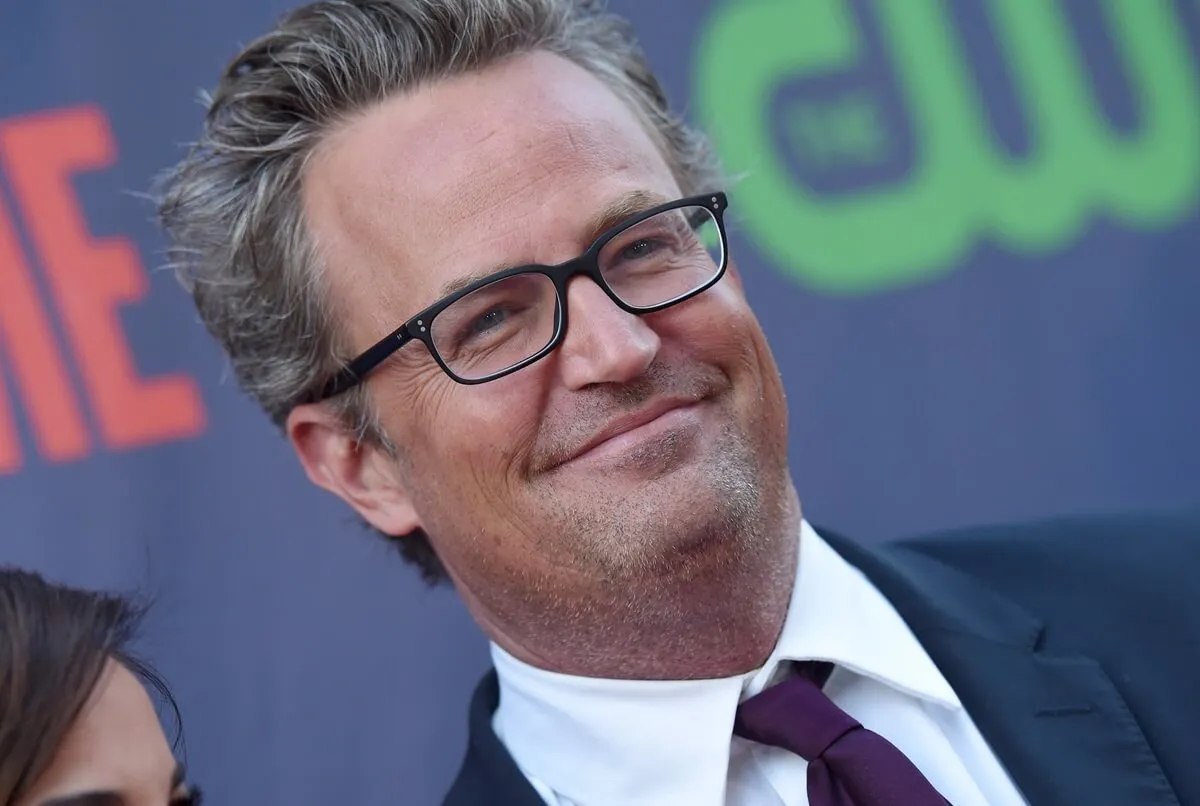 Matthew Perry arrives at CBS, CW And Showtime 2015 Summer TCA Party in a suit.