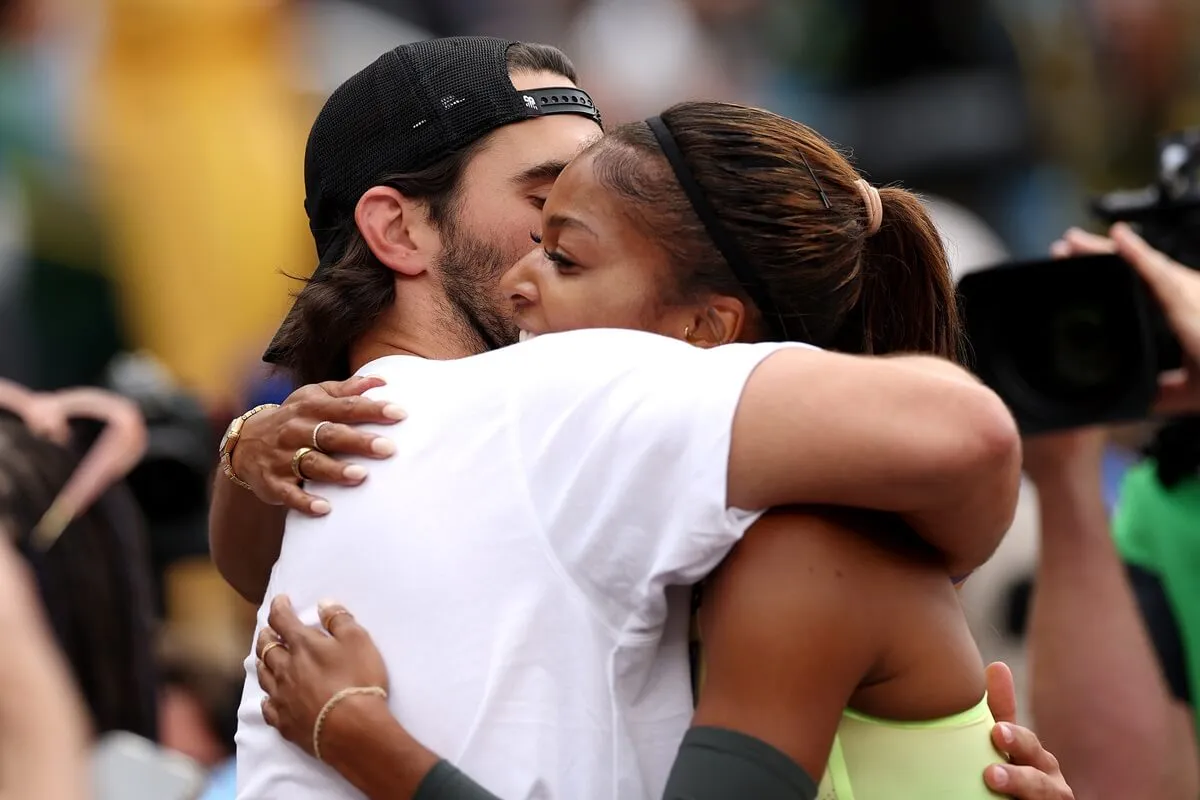 Gabby Thomas and boyfriend Spencer McManes embrace after she won the women's 200 meter final at 2024 U.S. Olympic Team Track & Field Trials