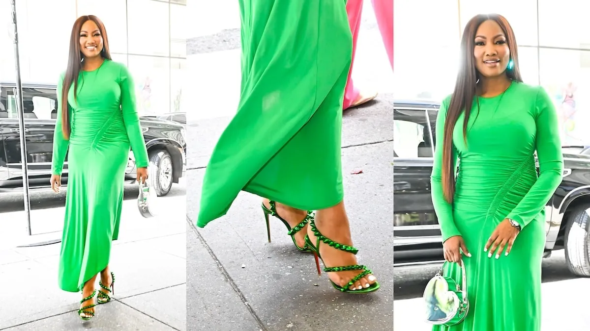 Wearing a neon green dress, Garcelle Beauvais enters the New York Live building