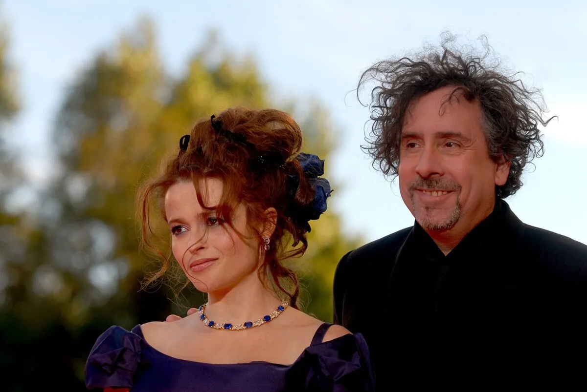 Helena Bonham Carter poising alongside Tim Burton at the Golden Lion for Lifetime Achievement Award.