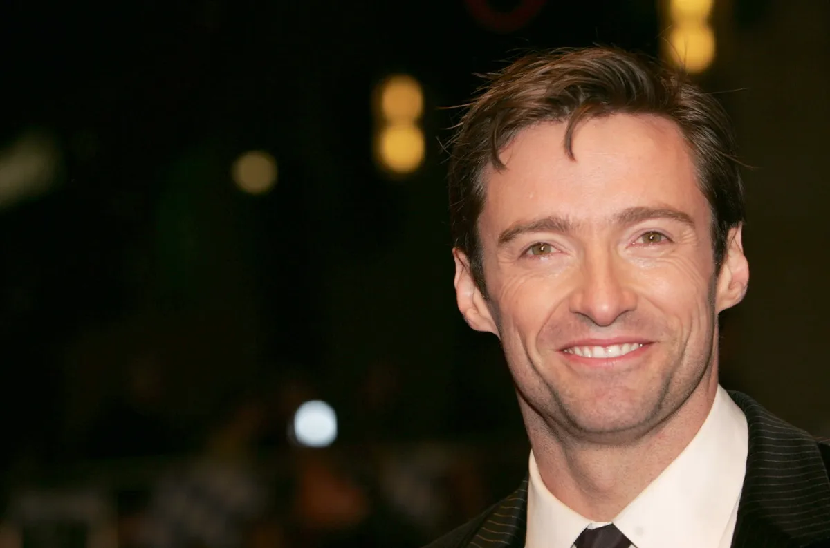 Hugh Jackman smiling at the premiere of 'The Prestige'.