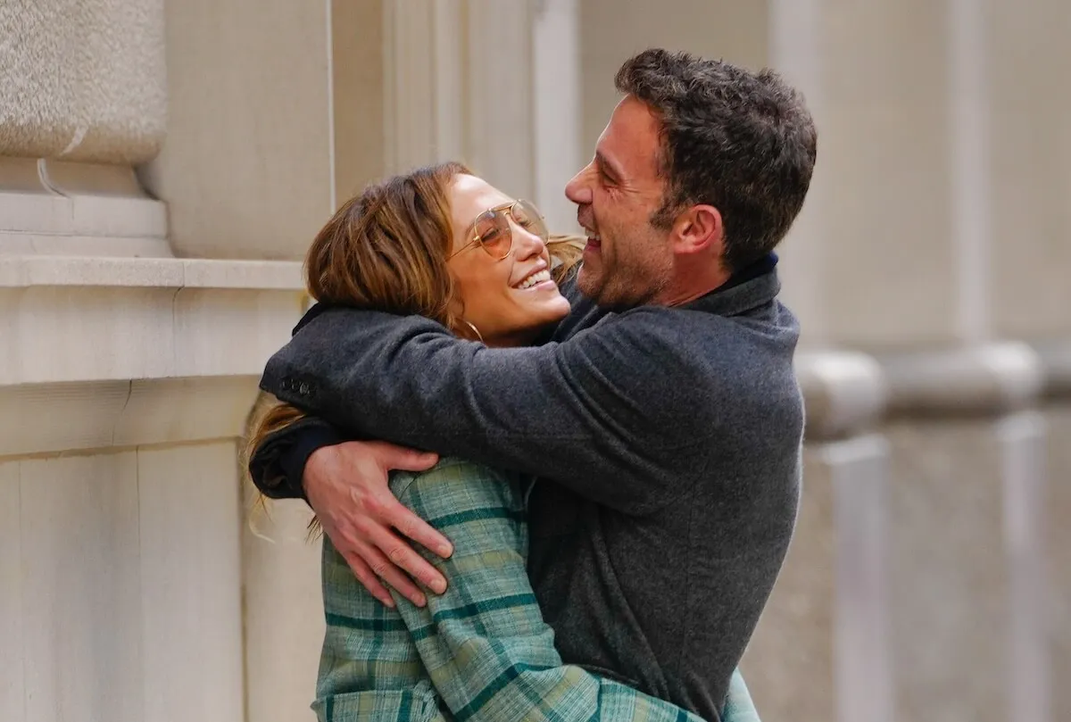 Jennifer Lopez and Ben Affleck embracing and smiling in 2021